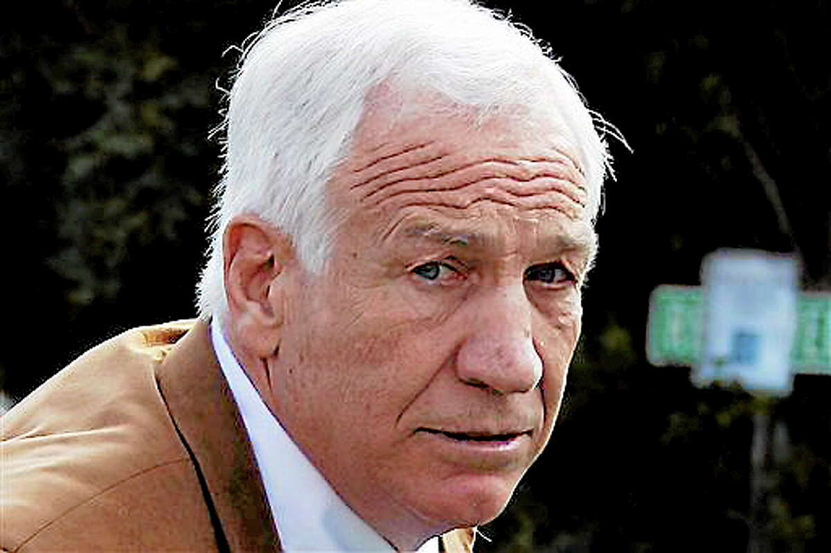 FILE - This June 22, 2012 file photo shows former Penn State assistant football coach Jerry Sandusky arriving at the Centre County Courthouse in Bellefonte, Pa. Sandusky should not get a new trial after being convicted of sexually abusing 10 boys, a Pennsylvania appeals court ruled Wednesday, Oct. 2, 2013. The decision by a three-judge Superior Court panel came barely two weeks after they heard oral arguments by Sandusky's lawyer and a state prosecutor. Sandusky, 69, is serving a 30- to 60-year prison sentence at a state prison in southwestern Pennsylvania. (AP Photo/Gene J. Puskar, File)