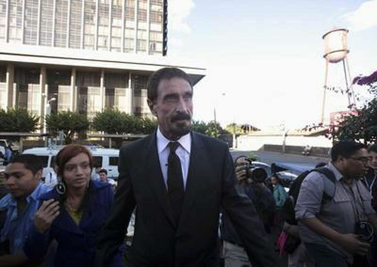 John Mcafee, anti-virus software guru, arrives for a news conference outside of the Supreme Court of Justice in Guatemala City, December 4, 2012