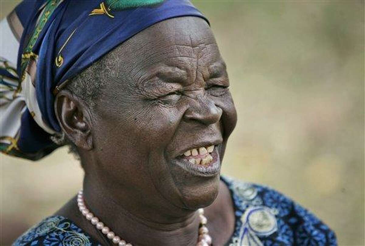 In this 2008 file photo, Sarah Obama, step-grandmother of U.S. President Barack Obama, sits in the backyard of her house in the village of Kogelo, near the shores of Lake Victoria, in Kenya. Obama's 91-year-old step-grandmother suffered bruises and shock after a car she was traveling in rolled over, a relative and a hospital official said Monday. Associated Press