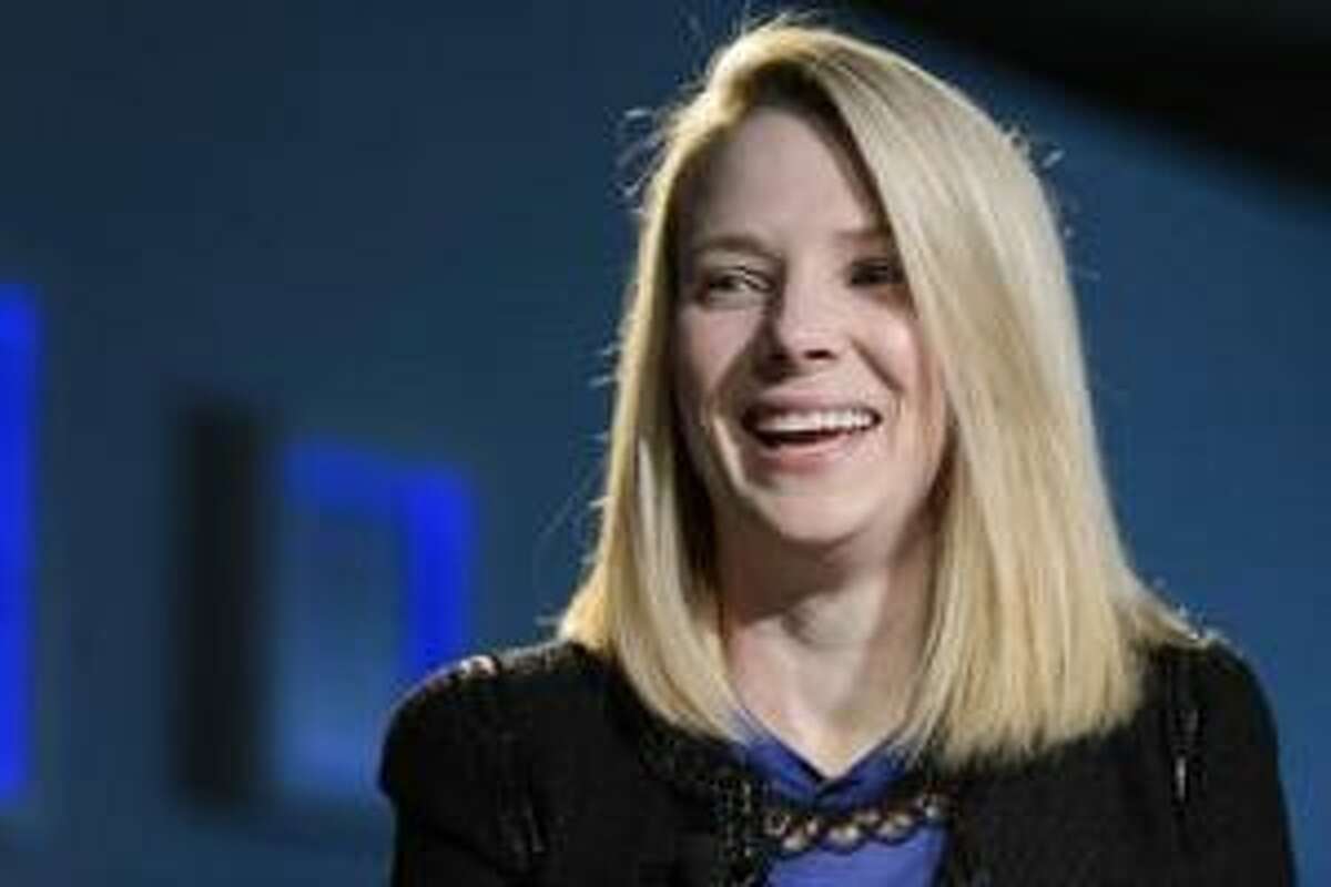 Marissa Mayer, Chief Executive Officer of Yahoo!, smiles during the 43rd Annual Meeting of the World Economic Forum, WEF, in Davos, Switzerland, Friday, Jan. 25, 2013. (AP Photo/Keystone/Laurent Gillieron)