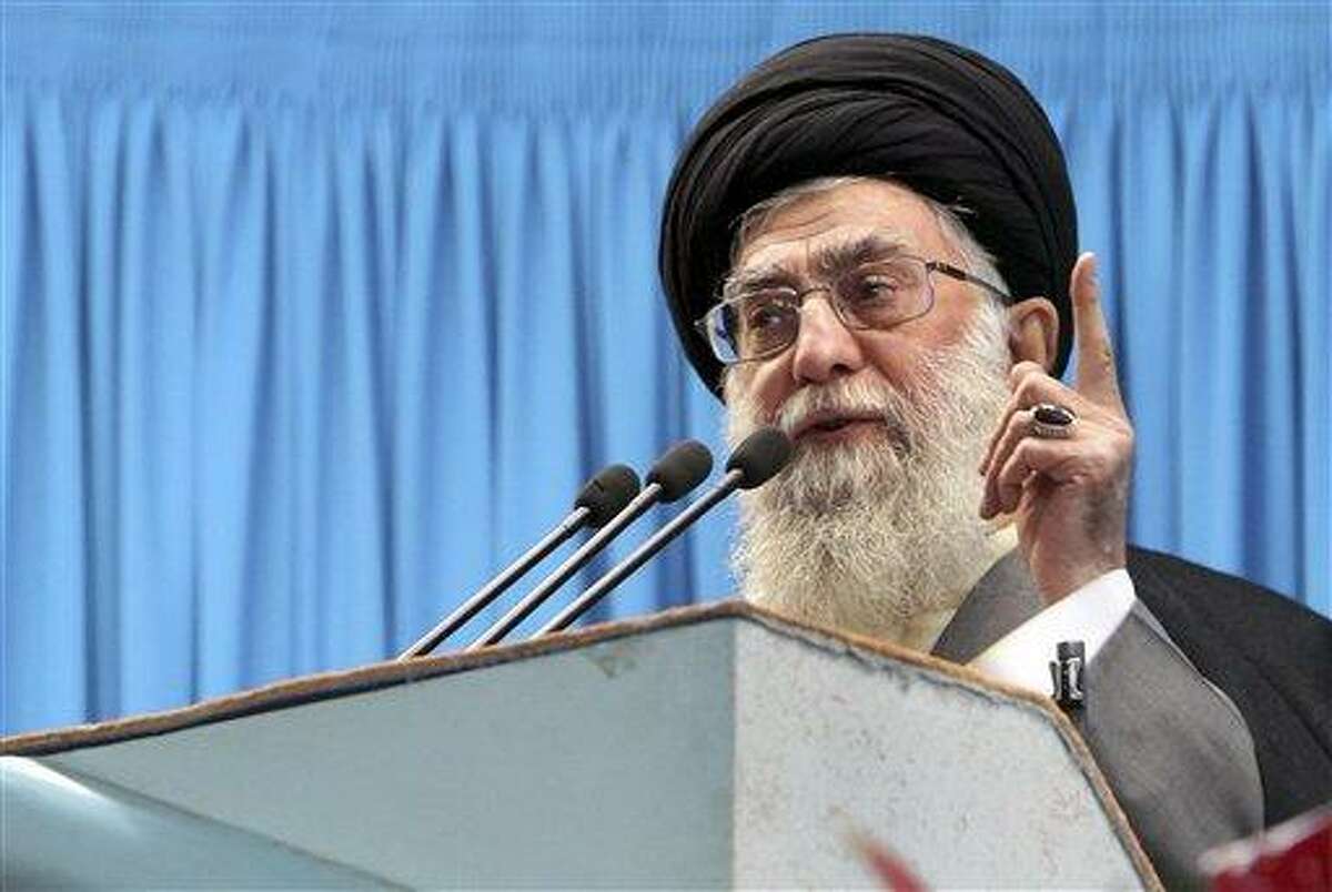 In this photo released by an official website of the Iranian supreme leader's office, Iranian supreme leader Ayatollah Ali Khamenei, delivers Friday prayers sermon, at the Tehran University campus, Iran, Friday, Feb. 3, 2012. Iran will help any nation or group that confronts the "cancer" Israel, Ayatollah Ali Khamenei said Friday. He also said in remarks delivered to worshippers at Friday prayers in Tehran and broadcast on state TV that the country would continue its controversial nuclear program, and warned that any military strike by the U.S. would only make Iran stronger. (AP Photo/Office of the Supreme Leader)
