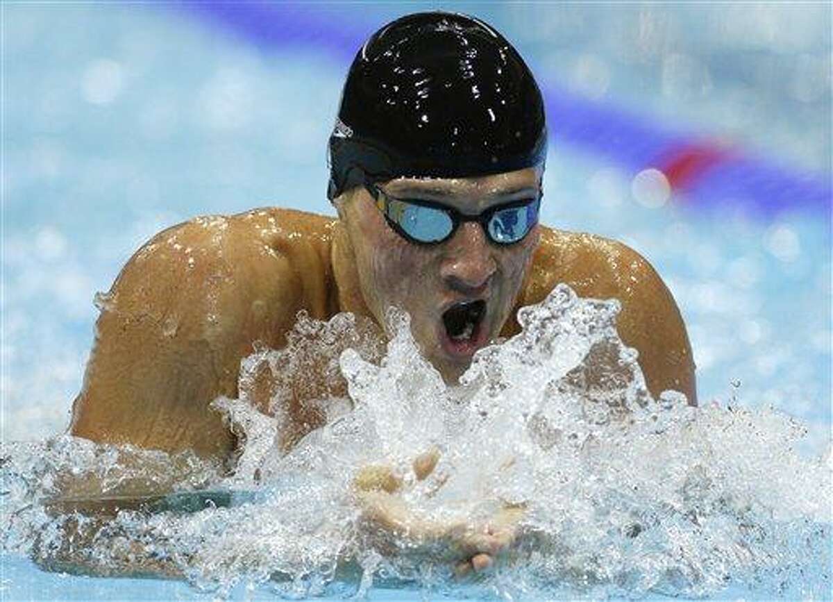 United States' Ryan Lochte swims to win the men's 400-meter individual medley swimming final at the Aquatics Centre in the Olympic Park during the 2012 Summer Olympics in London, Saturday, July 28, 2012. (AP Photo/Michael Sohn)