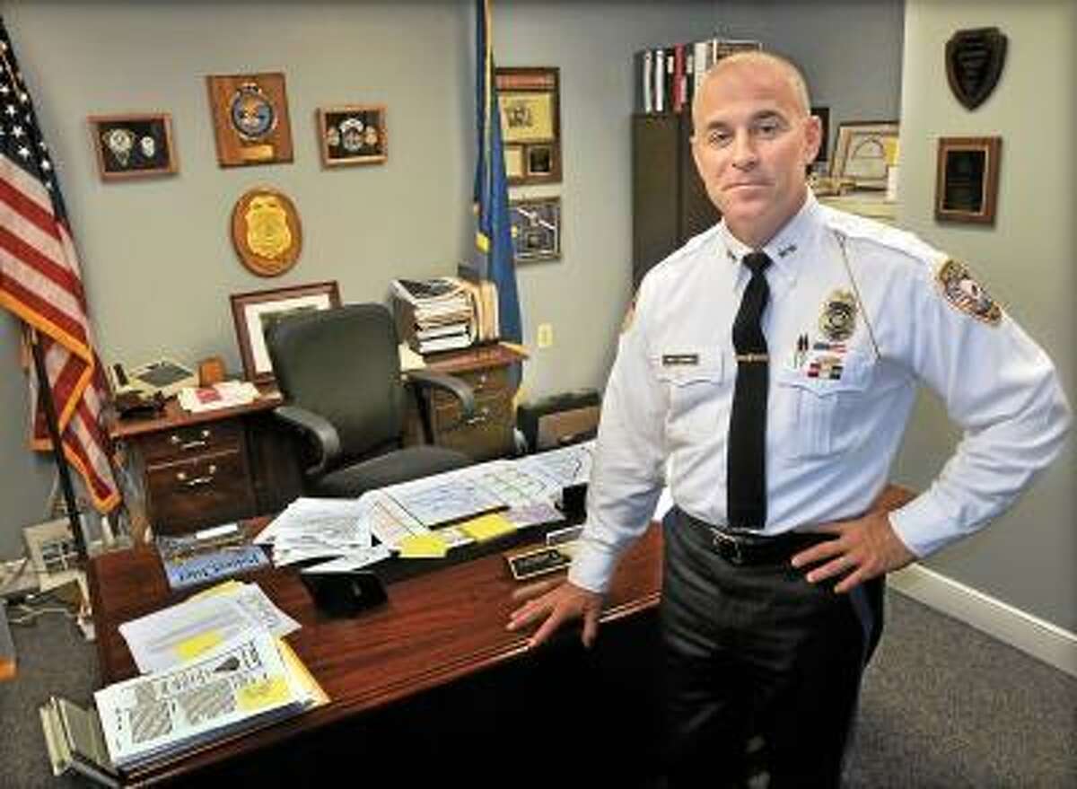 File photo of East Hampton Police Chief Matthew A. Reimondo in his office. Catherine Avalone