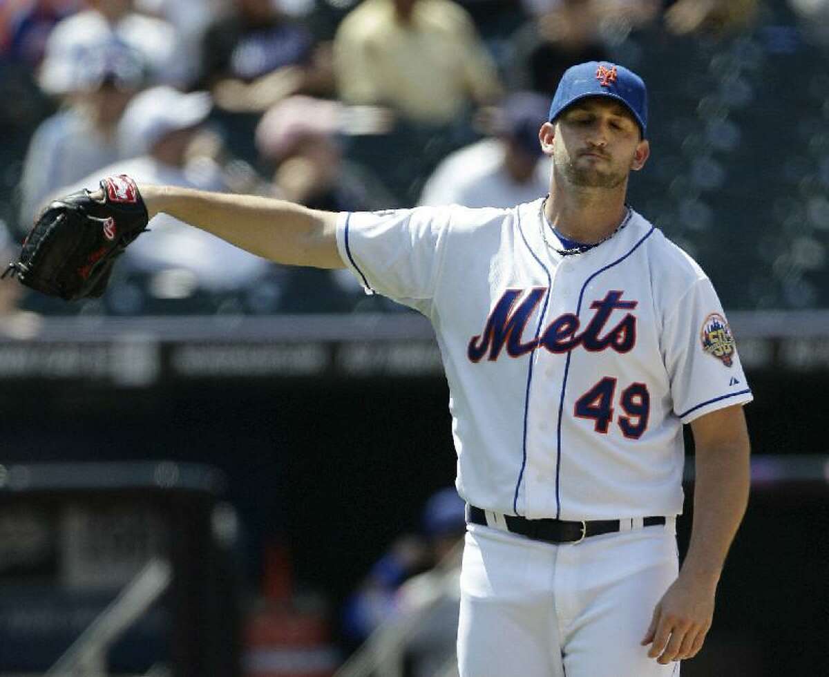 Mets can't dent Cubs' Ryan Dempster, who reaches 27 straight