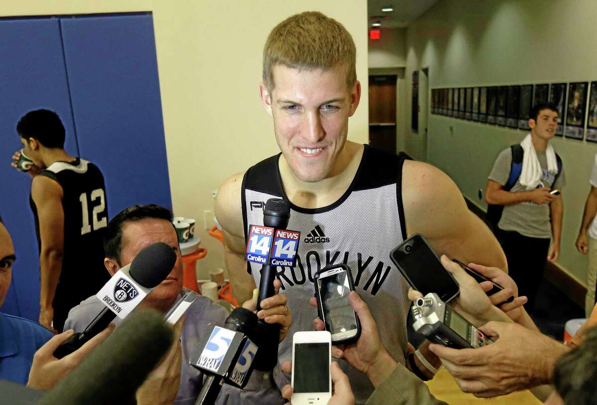 Brooklyn Nets rookie Mason Plumlee is interviewed during training camp Tuesday at Duke University in Durham, N.C.