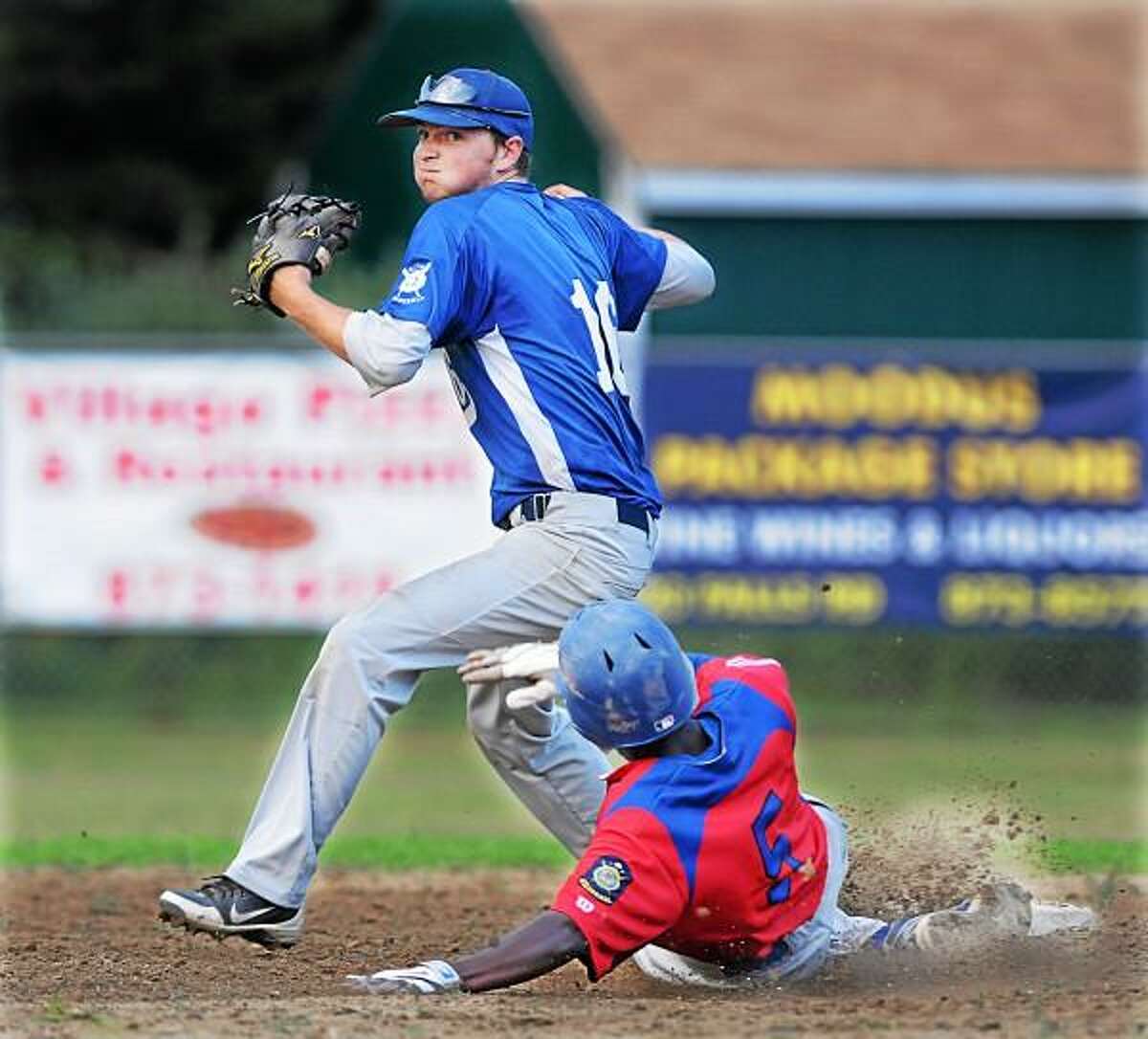 Middletown's Malcolm Allyene is forced out at second by East Haddam 's Troy DeLeone Tuesday evening at Memorial Field in East Haddam. Post 156 defeated Middletown 5-2. Photo by Catherine Avalone - The Middletown Press