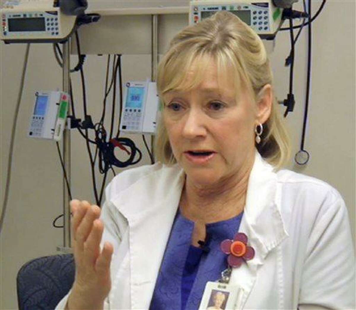 In this frame grab from Saturday, April 20, 2013, video, Massachusetts General Hospital nurse Jean Acquadra talks about the horrific early hours as bloody patients poured in after the explosions at the Boston Marathon. (AP Photo/Carla K. Johnson)