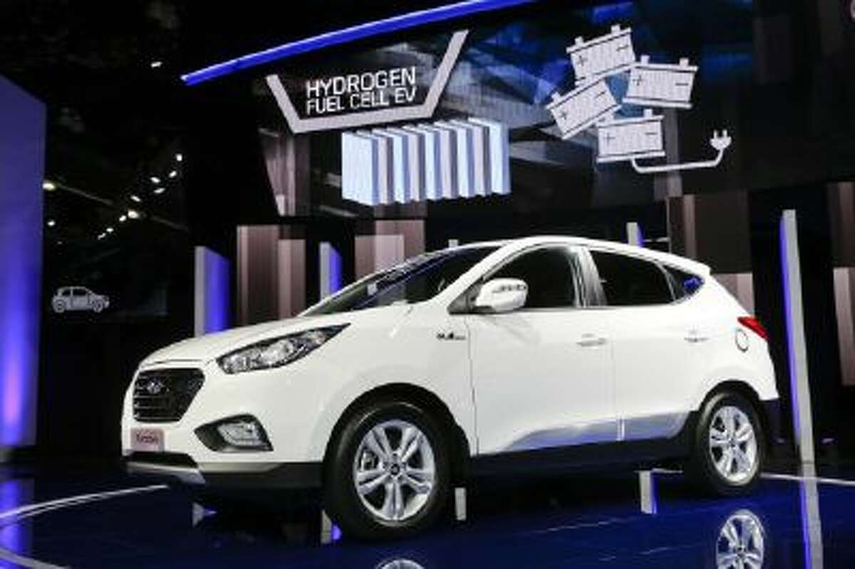 The 2015 Hyundai Tucson Fuel Cell hydrogen-powered electric vehicle is introduced at the auto show in Los Angeles on Nov. 20.