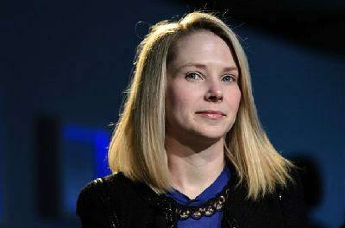In this Jan. 25, 2013, file photo, Marissa Mayer, CEO of Yahoo!, listens during the 43rd Annual Meeting of the World Economic Forum, in Davos, Switzerland. Yahoo Inc. reports quarterly financial results after the market closes. AP Photo/Keystone/Laurent Gillieron