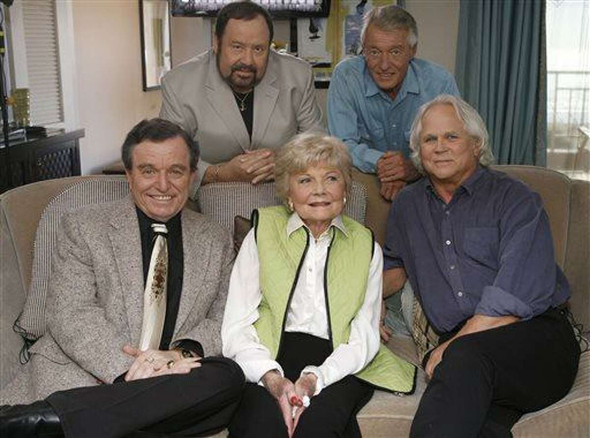 FILE - In this Sept. 27, 2007 file photo, seated, from left, Jerry Mathers, Barbara Billingsley and Tony Dow, and, standing from left, Frank Bank and Ken Osmond, pose for a photo as they are reunited to celebrate the 50th anniversary of the television show, "Leave it to Beaver," in Santa Monica, Calif. Bank, who played oafish troublemaker Lumpy on the sitcom "Leave It to Beaver," has died. A spokesman for the Hillside Memorial Park in Los Angeles said Bank, 71, died Saturday, April 13, 2013. (AP Photo/Damian Dovarganes)