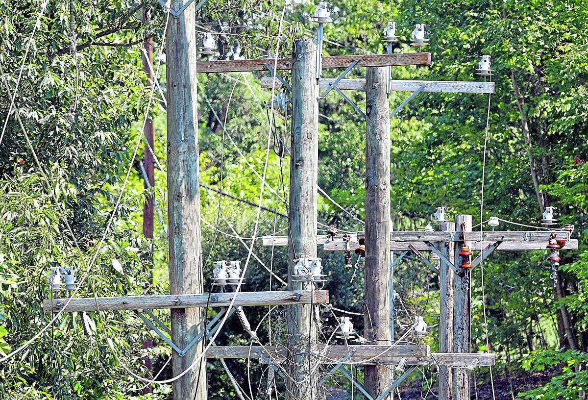 The five utility poles at the entrance gate at Powder Ridge in Middlefield have been replaced by AT&T and power is expected to be connected as early as Monday. Catherine Avalone — The Middletown Press