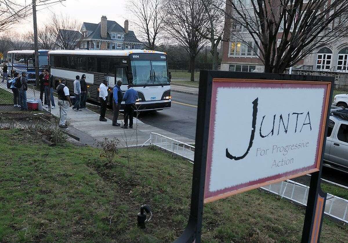 About 165 Connecticut residents meet at Junta for Progressive Action in New Haven early Wednesday morning to take buses to Washington, D.C., to attend a immigration reform rally. Peter Hvizdak/Register