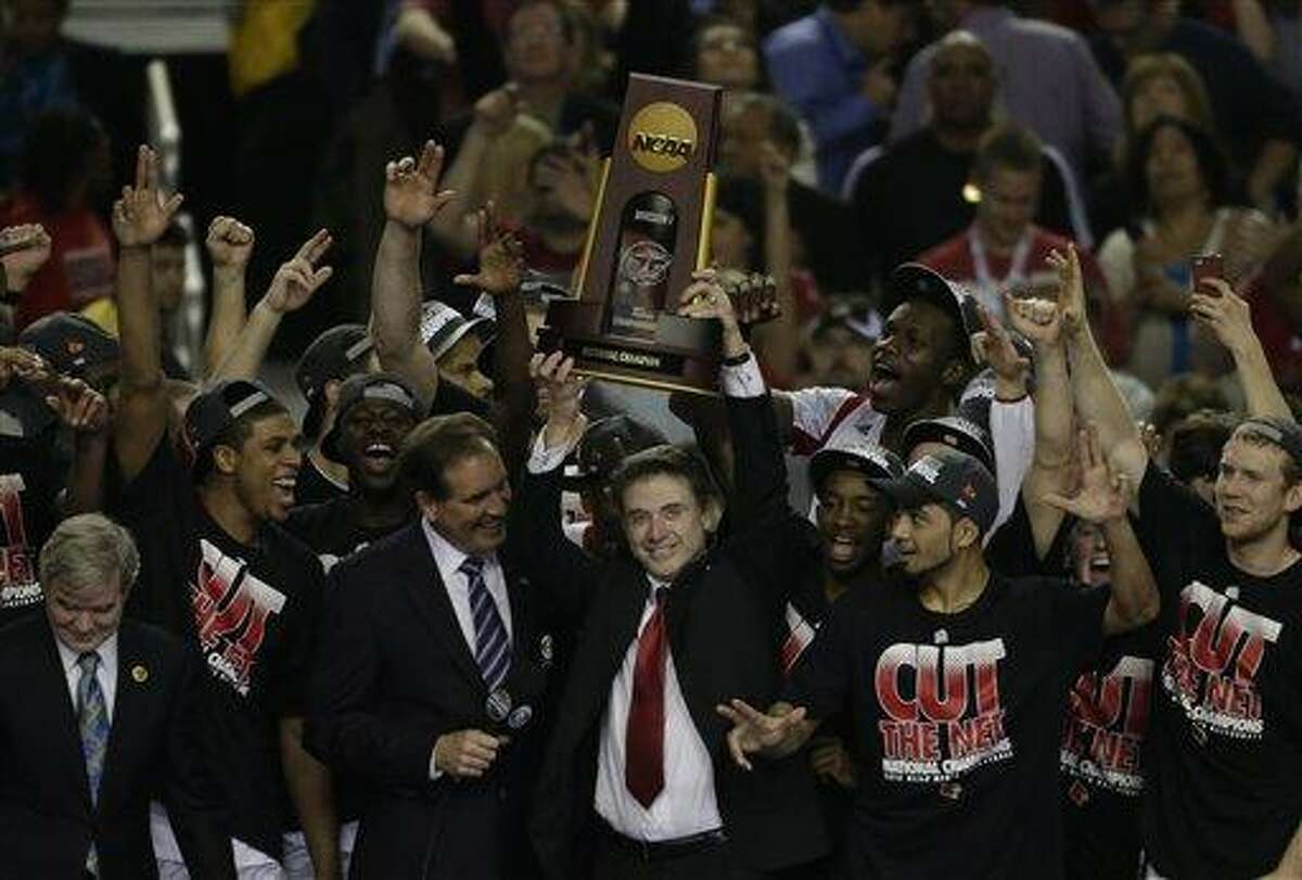 Louisville beats Michigan 82-76 for NCAA title