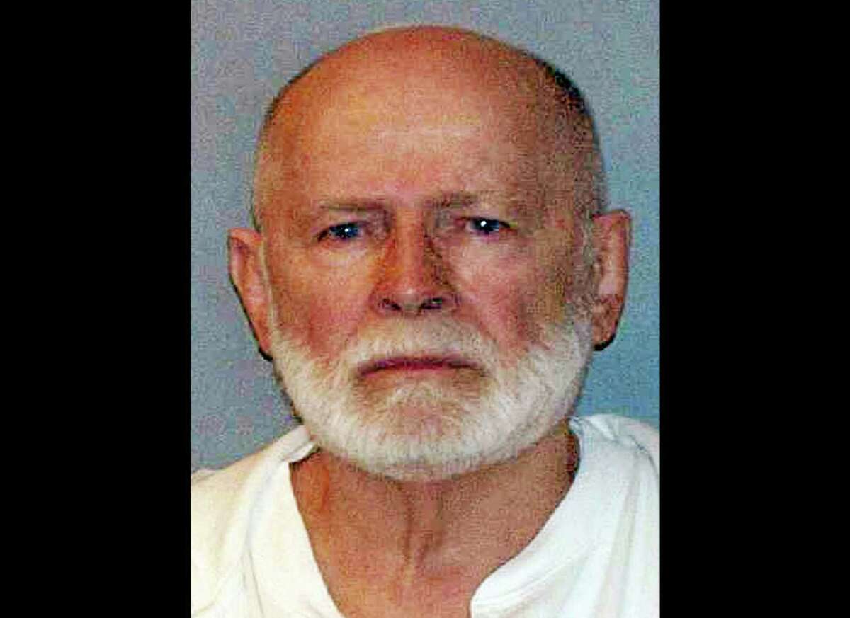 FILE - This June 23, 2011 booking file photo provided by the U.S. Marshals Service shows gangster James "Whitey" Bulger. Federal prosecutors argued Thursday, Nov. 7, 2013 that Bulger "deserves no mercy” and asked a judge to sentence him to two consecutive life sentences, plus five years, in a string of murders and extortions. Bulger, the 84-year-old former leader of the notorious Winter Hill Gang, was convicted in August after spending more than 16 years on the run. (AP Photo/ U.S. Marshals Service, File)