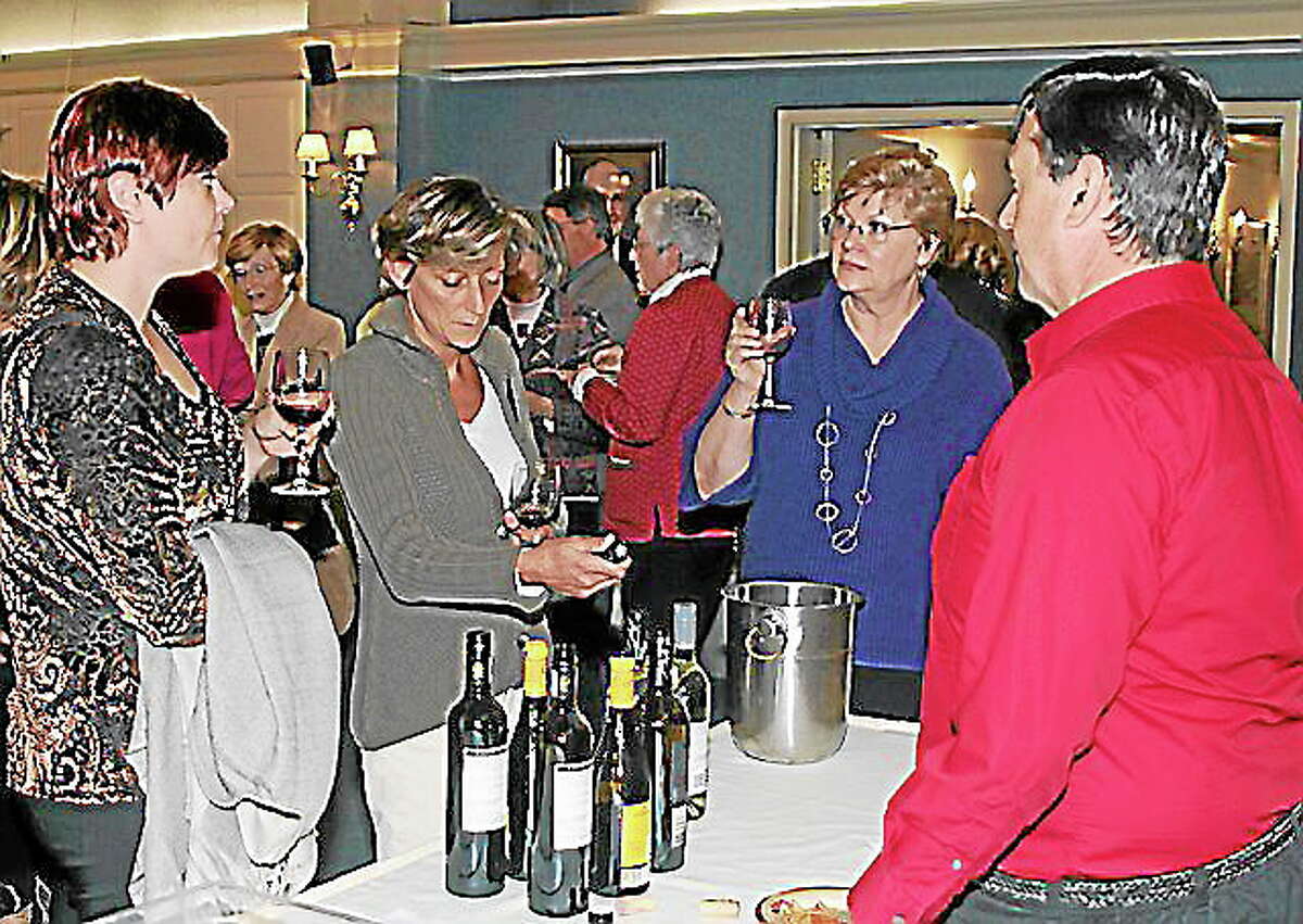 LVVS 3rd Annual Wine and Brew’s Fine Food and Festive Crowd Warmed Chilly Night Literacy Volunteers Valley Shore held its Third Annual Wine & Brew Tasting and Silent Auction on Friday October 25th Essex, CT. The event was sponsored by Essex Meadows and Centerbrook Package Store as well as Bailey, Murphy & Scarano LLC and Aztec Technology People and drew a crowd of 60 who enjoyed scrumptious food, a wide variety of wines and micro brews and bid on a selection of over 45 auction items during the course of the evening. LVVS Executive Director, John Ferrara noted, “This event was, by far, the most fun and biggest success in our history.” He added, “Thanks so much to our wine vendors, David Reynolds of Essex Meadows and Bob Grillo of Centerbrook Package Store who made this night possible.” As an accredited affiliate of ProLiteracy America, LVVS is in its third decade of helping people in Valley Shore towns learn to read, write, and speak better English to improve their work and life. These services are free of charge to the student and completely confidential. For further information contact the Literacy Volunteers office by calling (860) 399-0280, email info@vsliteracy.org or visit our website at www.vsliteracy.org. , 2013 at Essex Meadows, 30 Bokum Road, # # # For more information about this release, contact, Literacy Volunteers Valley Shore CT., Inc. John Ferrara, Executive Director (860) 399-0280 or by e-mail at jferrara@vsliteracy.org