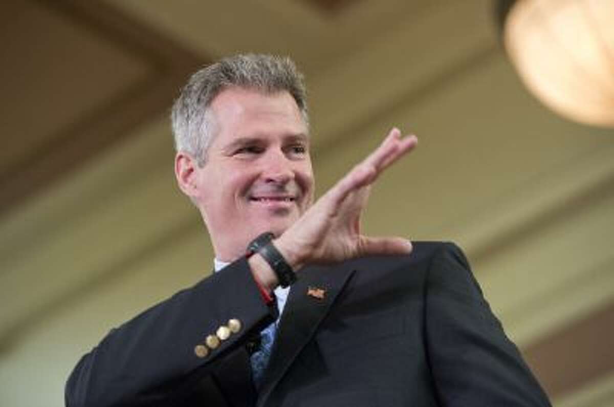 UNITED STATES - OCTOBER 20: Sen. Scott Brown, R-Mass., attends a rally at Memorial Hall in Melrose, Mass., also attended by Sen. John McCain, R-Ariz. Brown is being challenged for his seat by democrat Elizabeth Warren. (Photo By Tom Williams/CQ Roll Call)