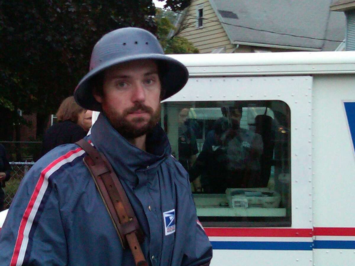 Mail carrier Brian St. John found two children who were in a vehicle that was car jacked Monday and returned them to their mother. Photo by William Kaempffer