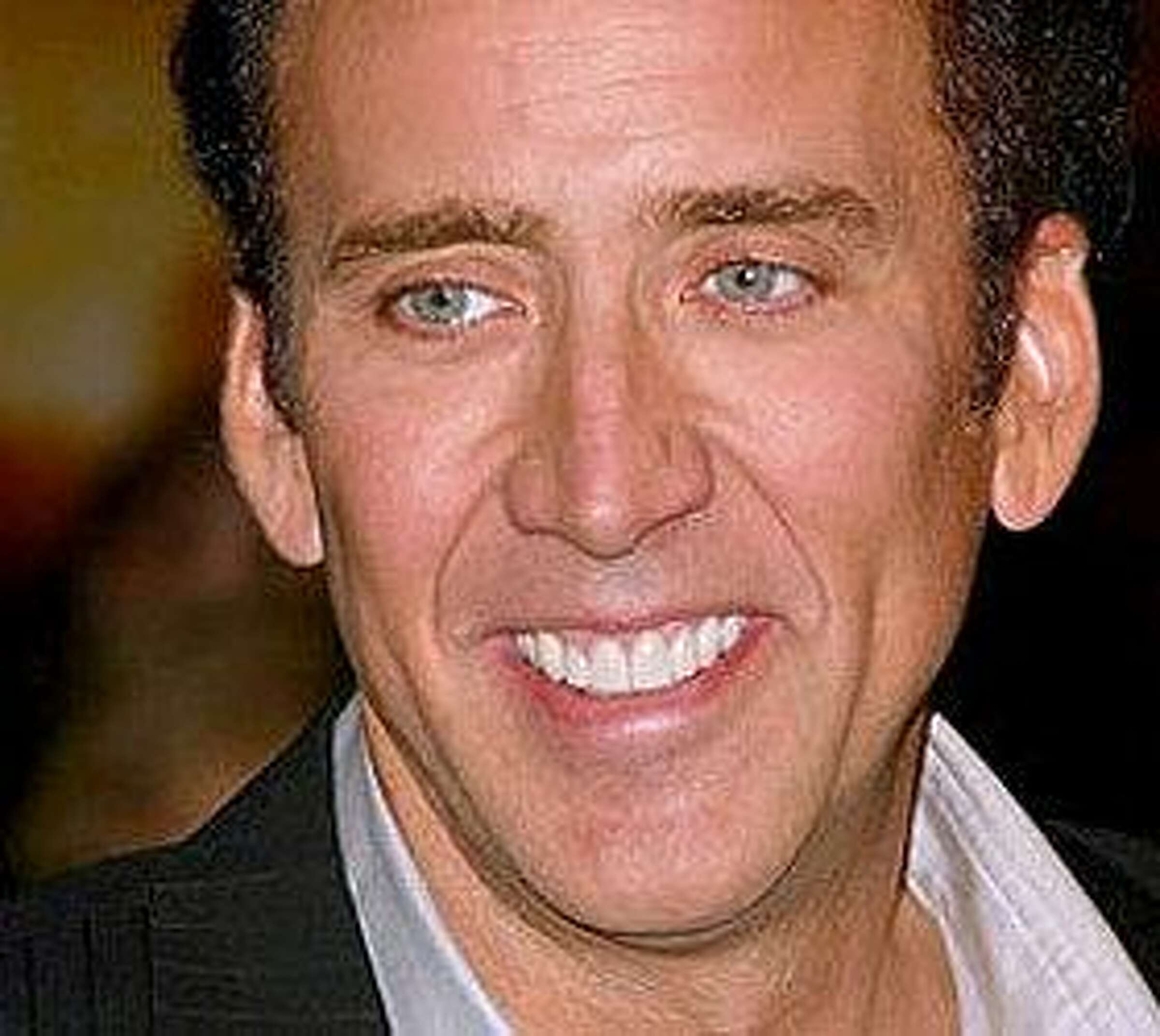 Actor Nicholas Cage woken up by naked man eating a fudgesicle