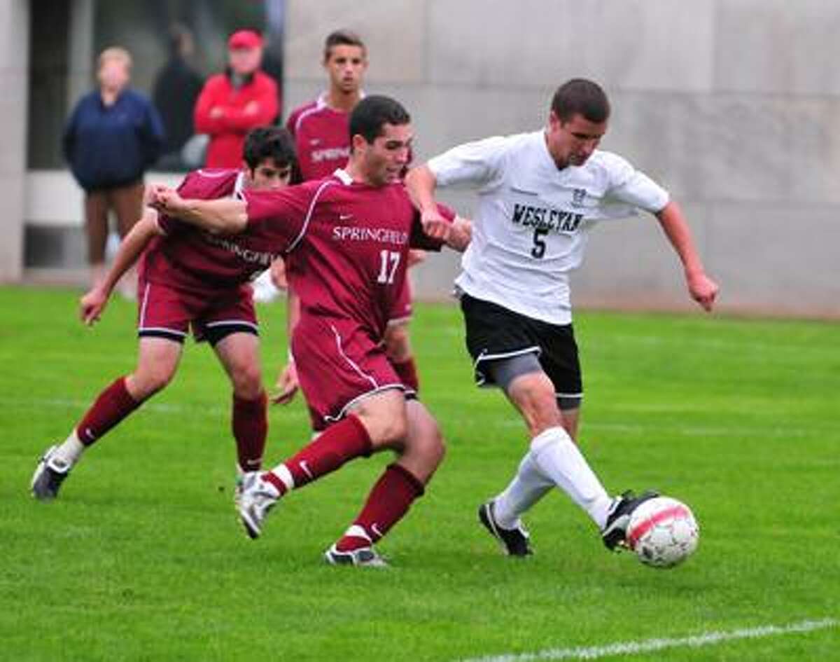 Wesleyan's men's soccer player, Geoff Zartarian (5), gains possession of the ball against Springfield College last season. Zartarian is a tri-captain for the 2010 Cardinals. (Photo courtesy of Peter Stein