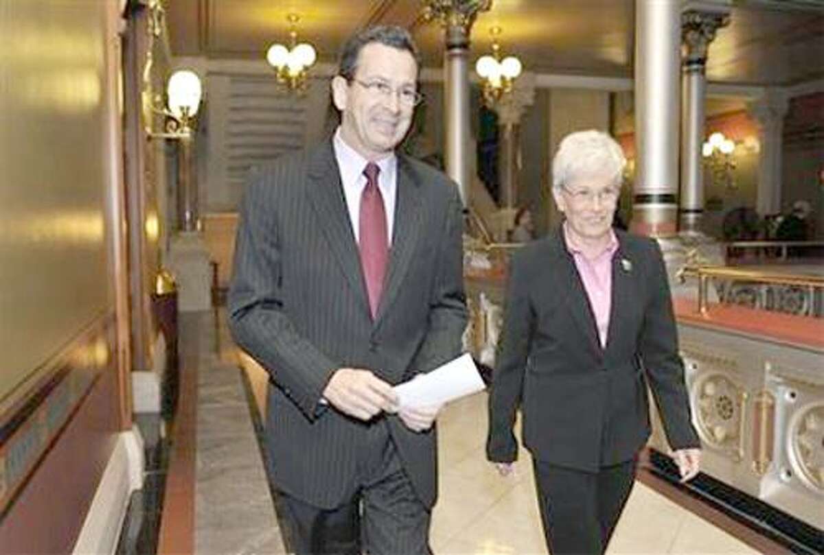 Governor- Elect Dan Malloy is seen with running mate Nancy Wyman arrive for a news conference - Hartford, CT - Nov 8, 2010 - AP Photo/Jessica Hill