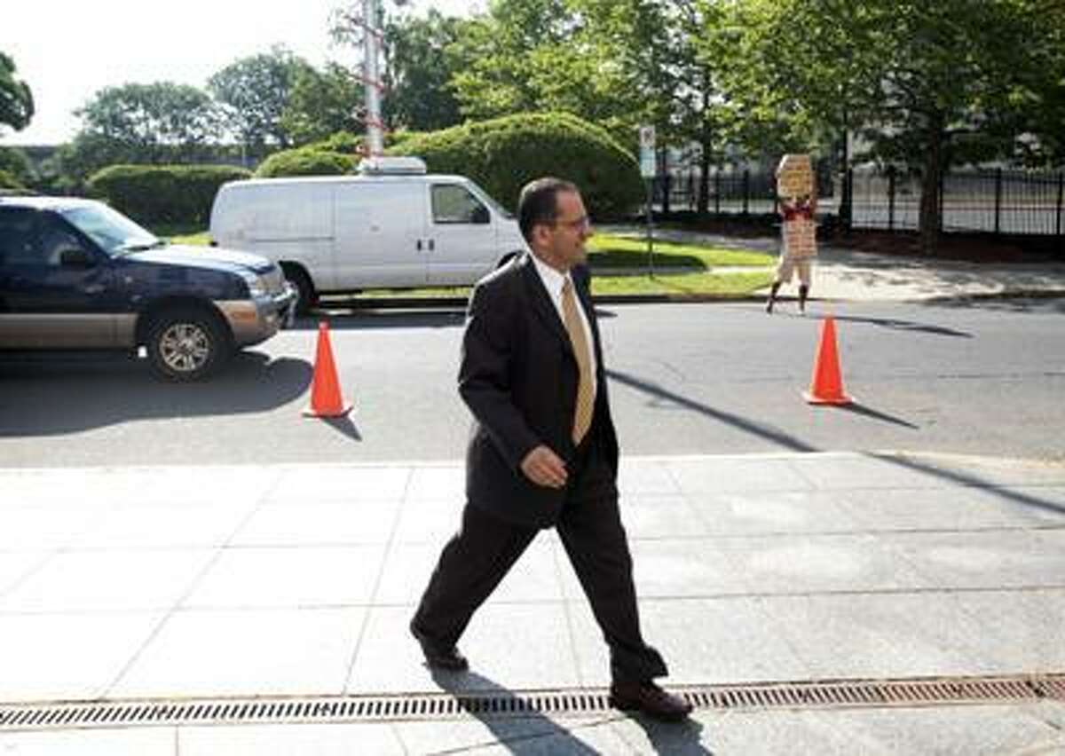 Hartford Mayor Eddie Perez enters Hartford Superior Court on June 18, 2010 on the second day of jury deliberations in his corruption trial in Hartford, Conn. A Connecticut jury has convicted Perez of corruption charges, including accepting home improvements as a bribe and trying to extort money from a real estate developer. (AP)