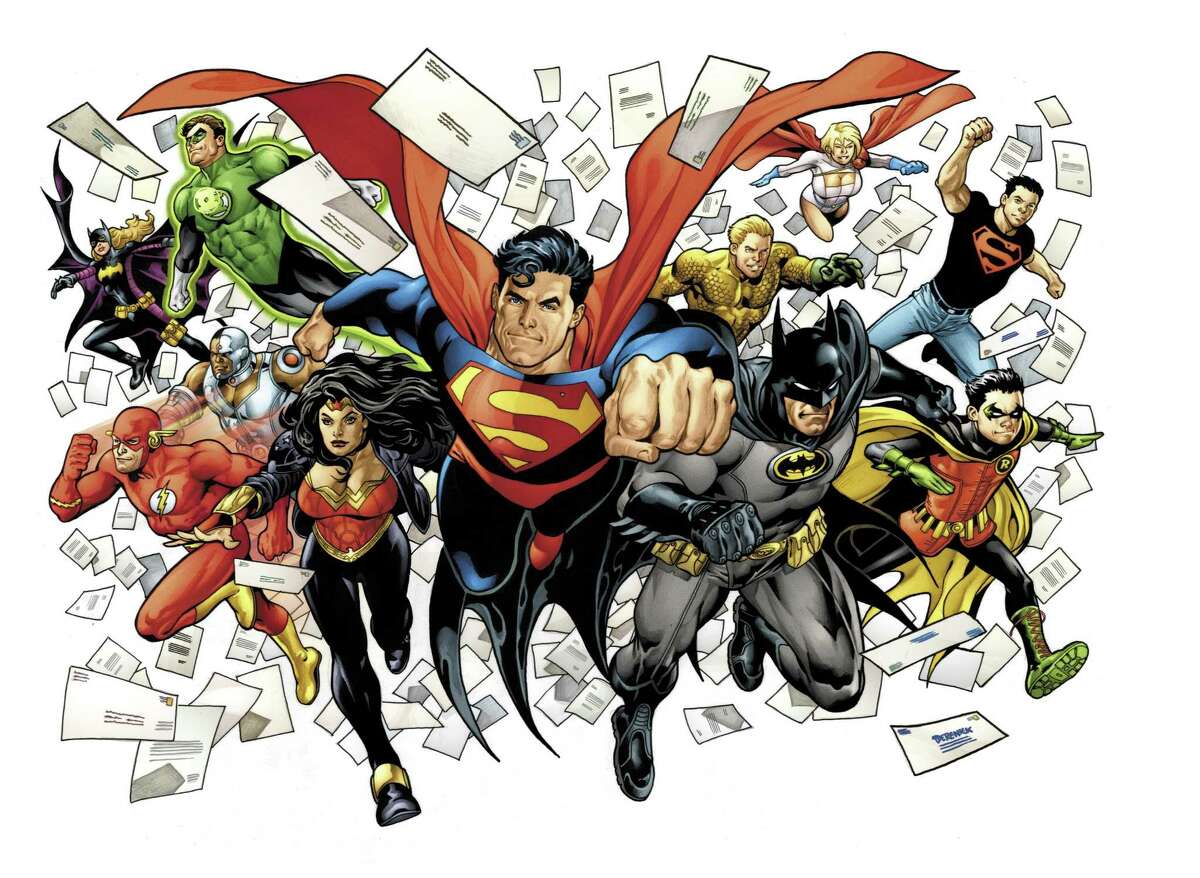 In this image released by DC Comics, including, front row from left, The Flash, Wonder Woman, Superman, Batman and Robin, back row from left, Batgirl, Cyborg (behind The Flash), Green Lantern, Aquaman, Power Girl and Superboy are shown. (AP Photo/DC Comics)