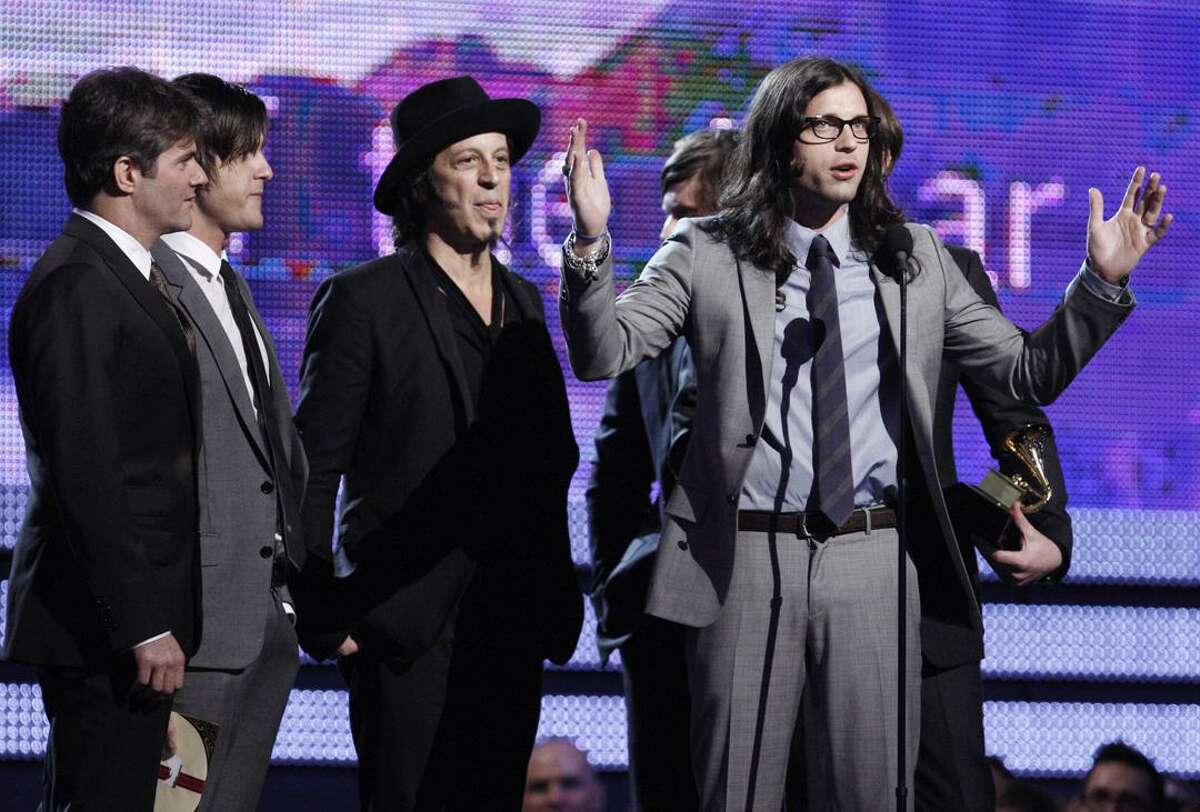 In this Sunday, Jan. 31, 2010, file photo, the Kings of Leon accept the award for record of the year for "Use Somebody" at the Grammy Awards in Los Angeles. Bonnaroo organizers announced Tuesday, a lineup that features the likes of Kings of Leon and the Dave Matthews Band. (AP)