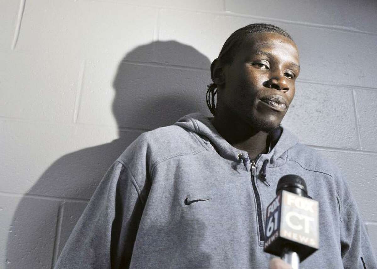 ASSOCIATED PRESS FILE PHOTO In this May 7, 2010 file photo, Connecticut's Ater Majok speaks to the media after a news conference for men's basketball coach Jim Calhoun in Storrs. Majok withdrew from the school after playing in just 26 games for the Huskies. Majok was taken late Thursday night with the 58th pick in the NBA Draft by the Los Angeles Lakers.