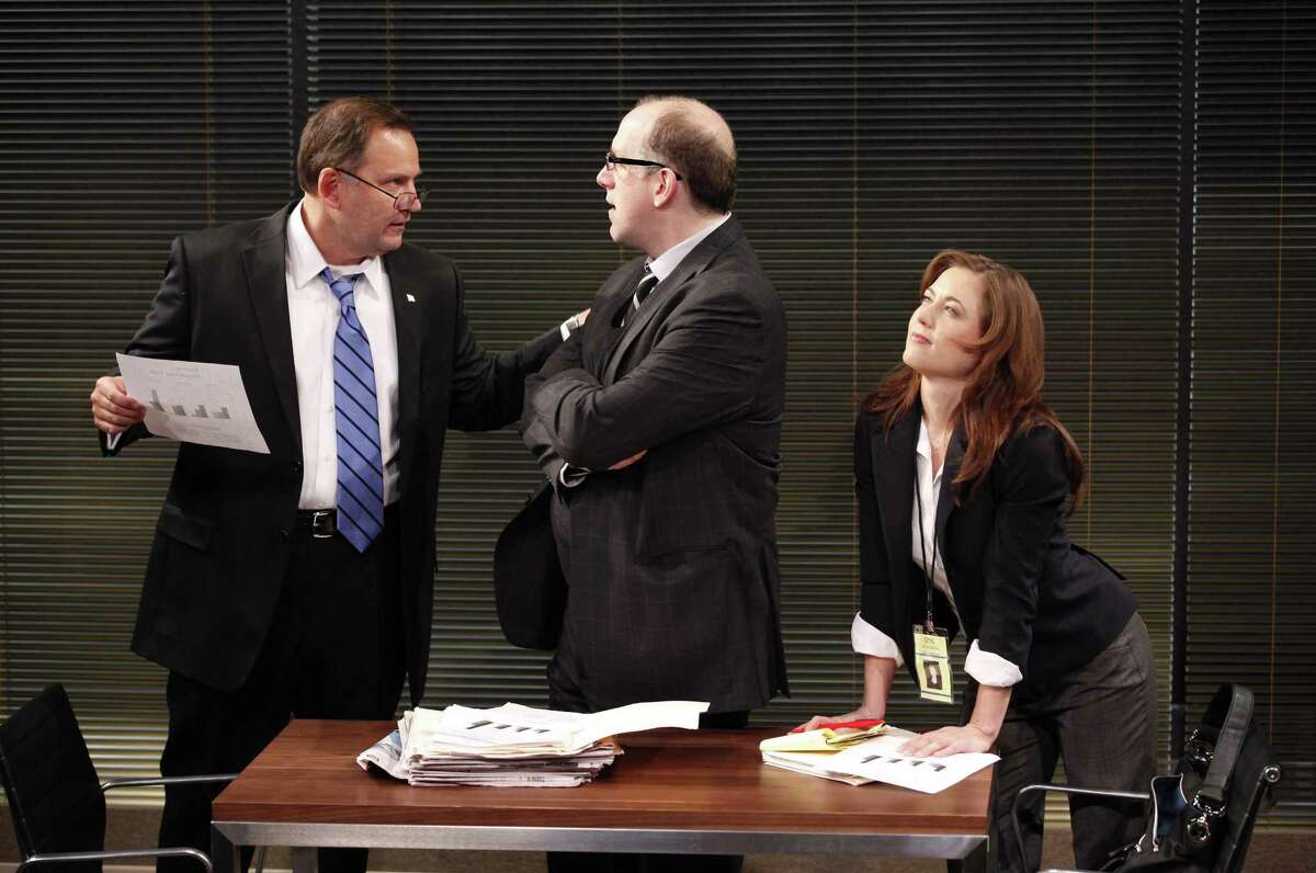 In this theater publicity image released by Karen Greco Public Relations, Brian Dykstra, left, Michael Puzzo and Eve Danzeisen, right, are shown in a scene from, "The Body Politic," in New York. (AP Photo/Karen Greco Public Relations, Carol Rosegg)