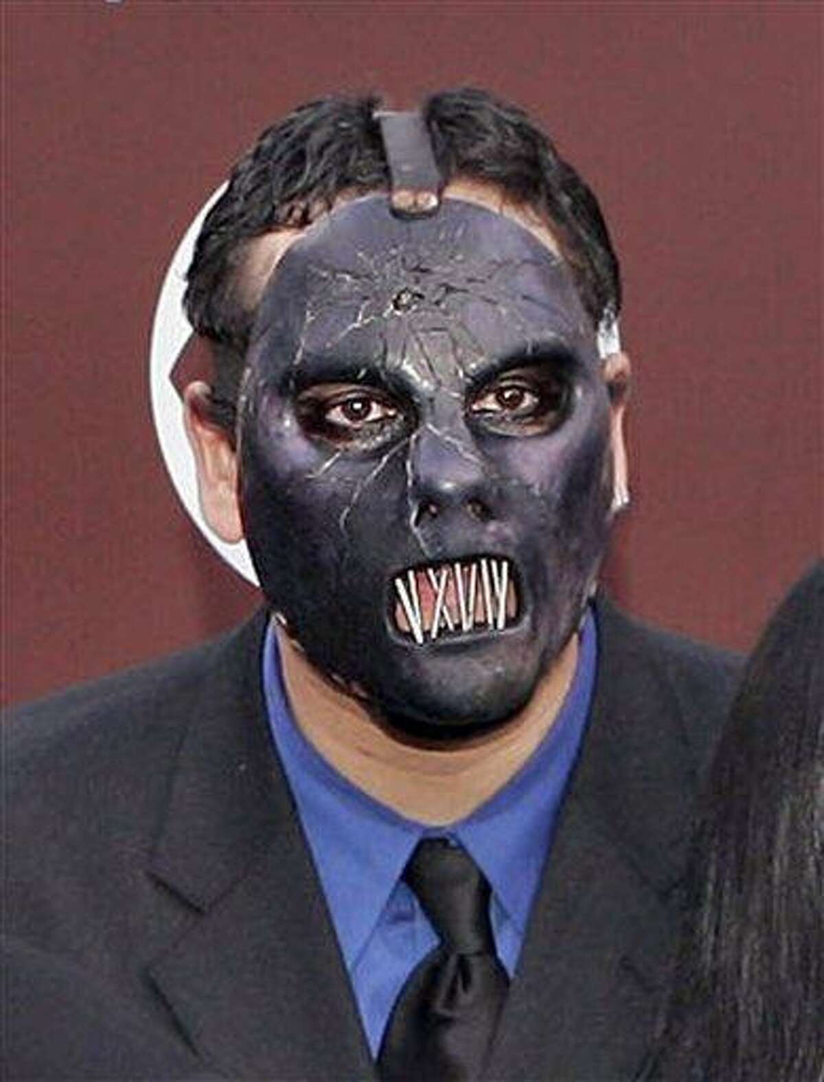 FILE - In this Feb. 13, 2005 file photo, Paul Gray from the group Slipknot arrives for the 47th Annual Grammy Awards at the Staples Center in Los Angeles. Autopsy results show the bassist for heavy metal band Slipknot died of an accidental overdose of morphine and fentanyl, a synthetic morphine substitute, police said Monday June 21, 2010. (AP Photo/Mark J. Terrill, file)