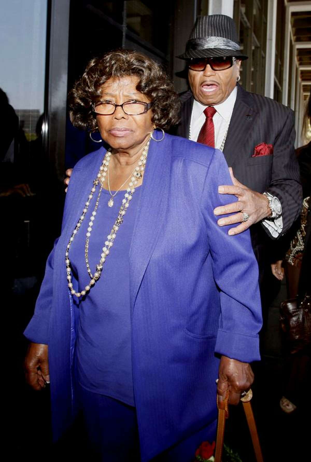 In this June 14 file photo, Michael Jackson's parents, Katherine Jackson and Joe Jackson leave a Los Angeles courthouse after a preliminary hearing in the trial of Michael Jackson's personal doctor Conrad Murray. (AP)