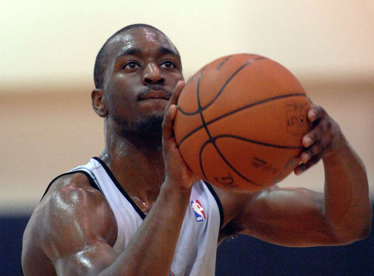 University of Connecticut's Kemba Walker shoots during pre-draft workouts for the Charlotte Bobcats basketball team in Charlotte, N.C., Friday, June 3, 2011. (AP Photo/The Charlotte Observer, Todd Sumlin)