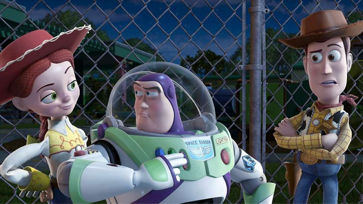 In this film publicity image released by Disney, from left, Jessie, voiced by Joan Cusack, Buzz Lightyear, voiced by Tim Allen and Woody, voiced by Tom Hanks are shown in a scene from "Toy Story 3." (AP)