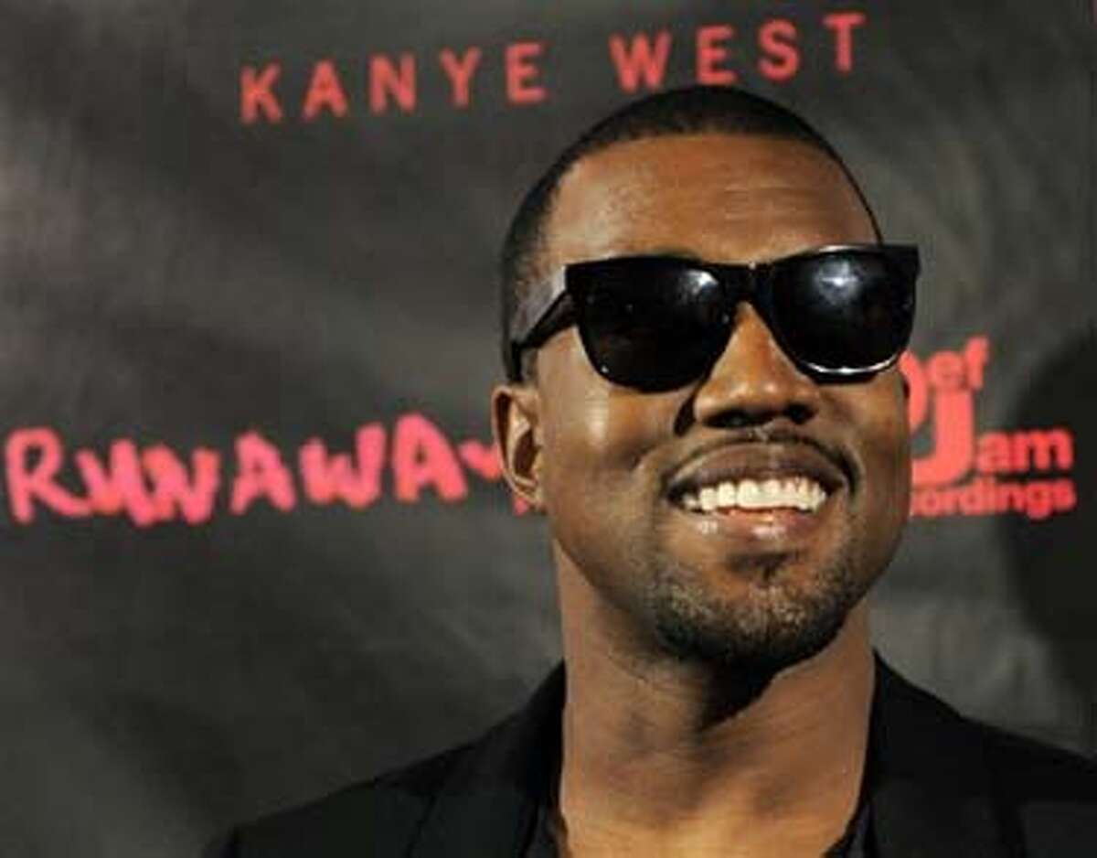 Hip-hop artist Kanye West arrives for a screening of "Runaway," a short film He directed that will accompany his forthcoming album "My Beautiful Dark Twisted Fantasy," Monday, Oct. 18, 2010, in Los Angeles. (AP Photo/Chris Pizzello)