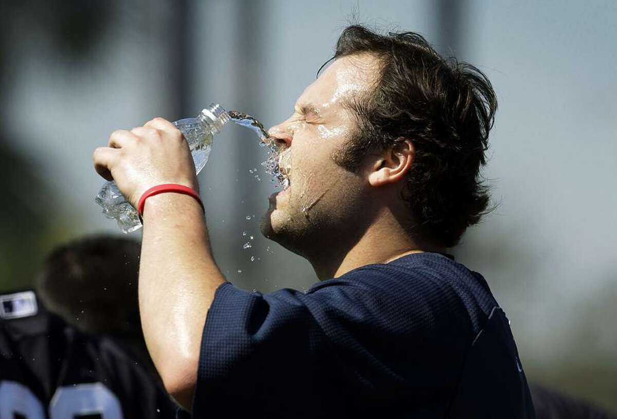 during the first day of pitchers and catchers at a baseball spring training workout Tuesday, Feb. 15, 2011, at Steinbrenner Field in Tampa, Fla. (AP Photo/Charlie Neibergall)
