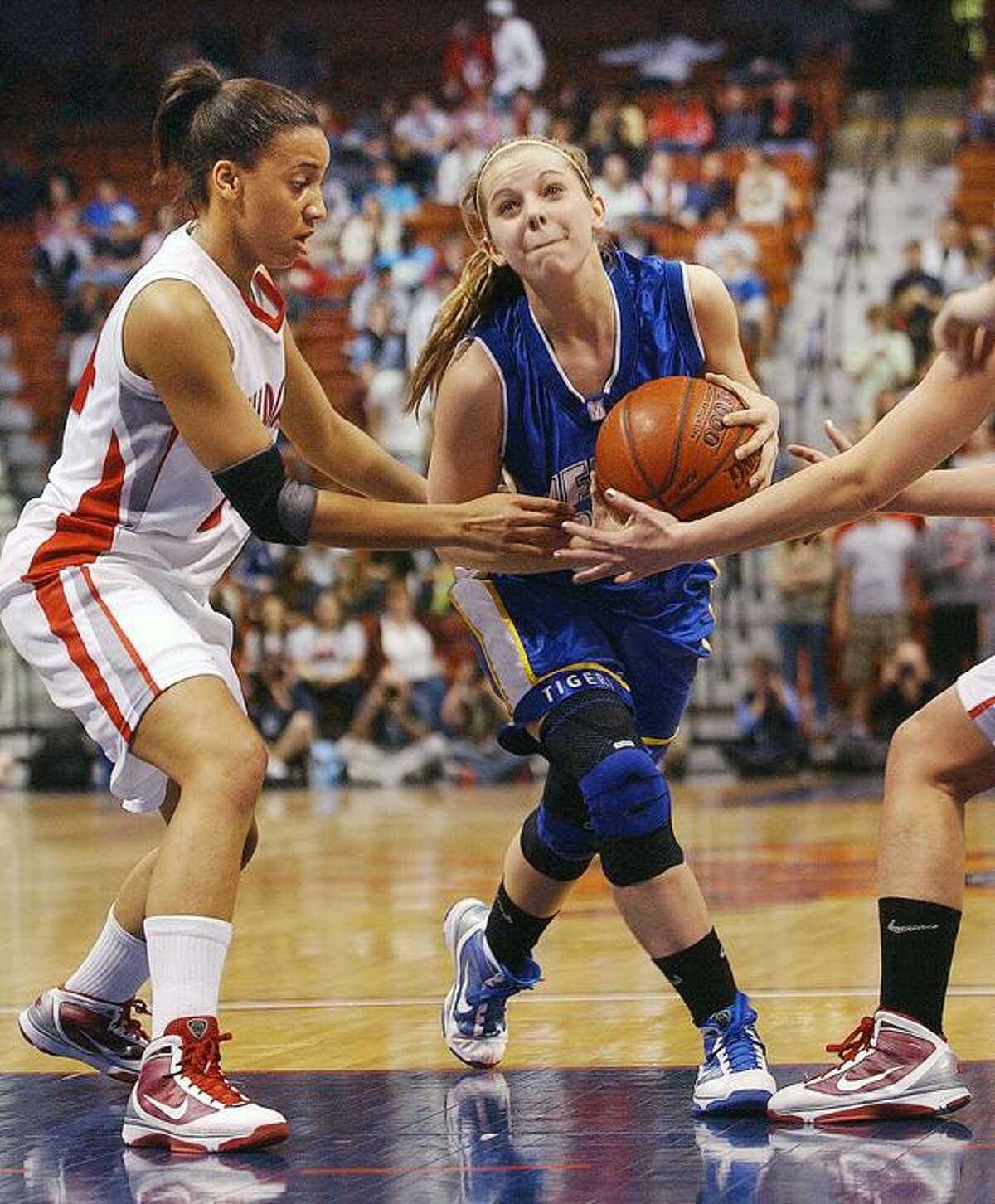 Mercy's Amber Bepko drives the lane against Norwich Free Academy in the Class LL state championship at Mohegan Sun. (Catherine Avalone / Middletown Press)