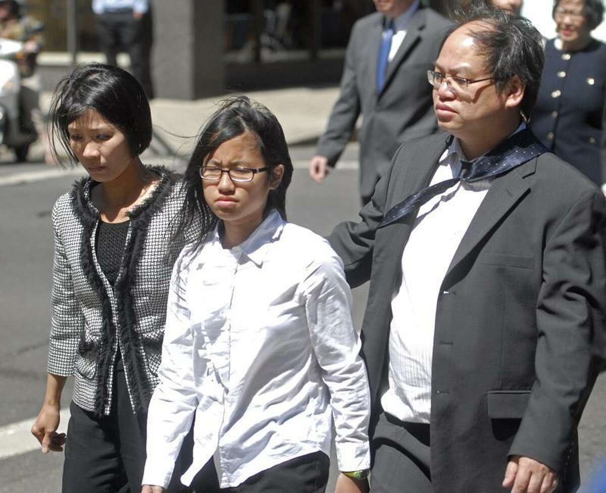 New Haven--Friends and family of Annie Lei enter New Haven Superior Court Friday morning for the sentencing of Raymond Clark Jr. Photo by Brad Horrigan/New Haven Register-06.03.11.