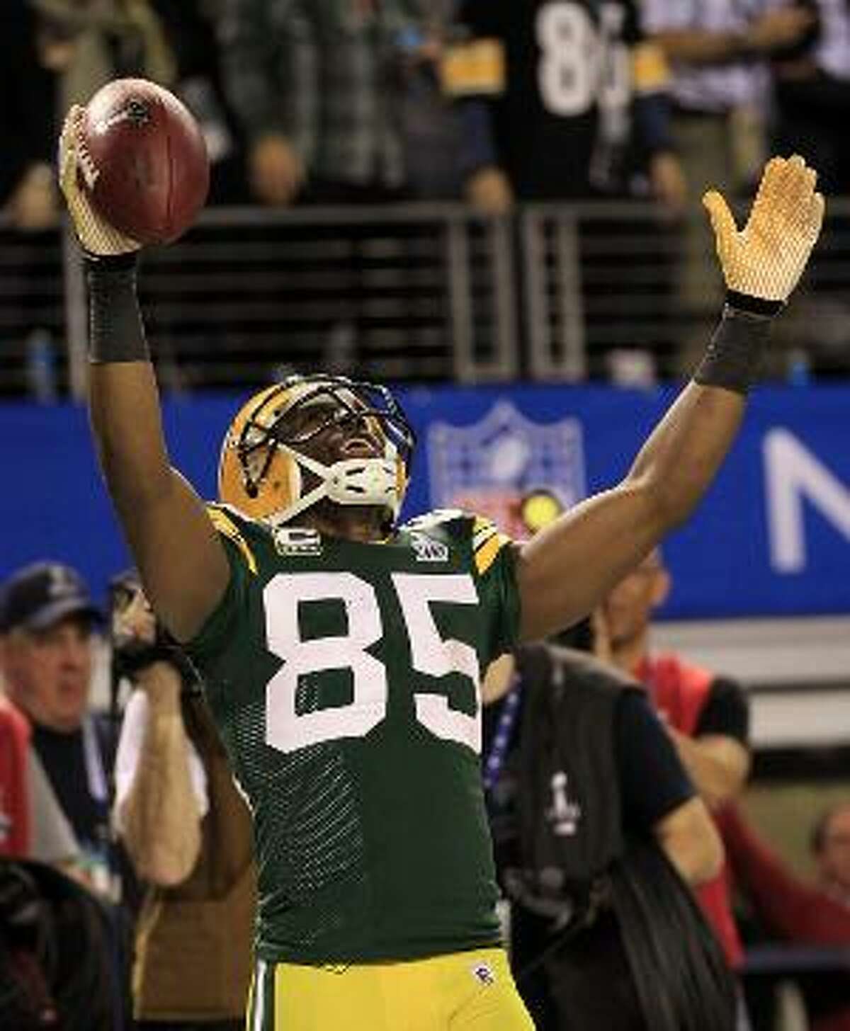 Green Bay Packers' Donald Driver celebrates his reception, to