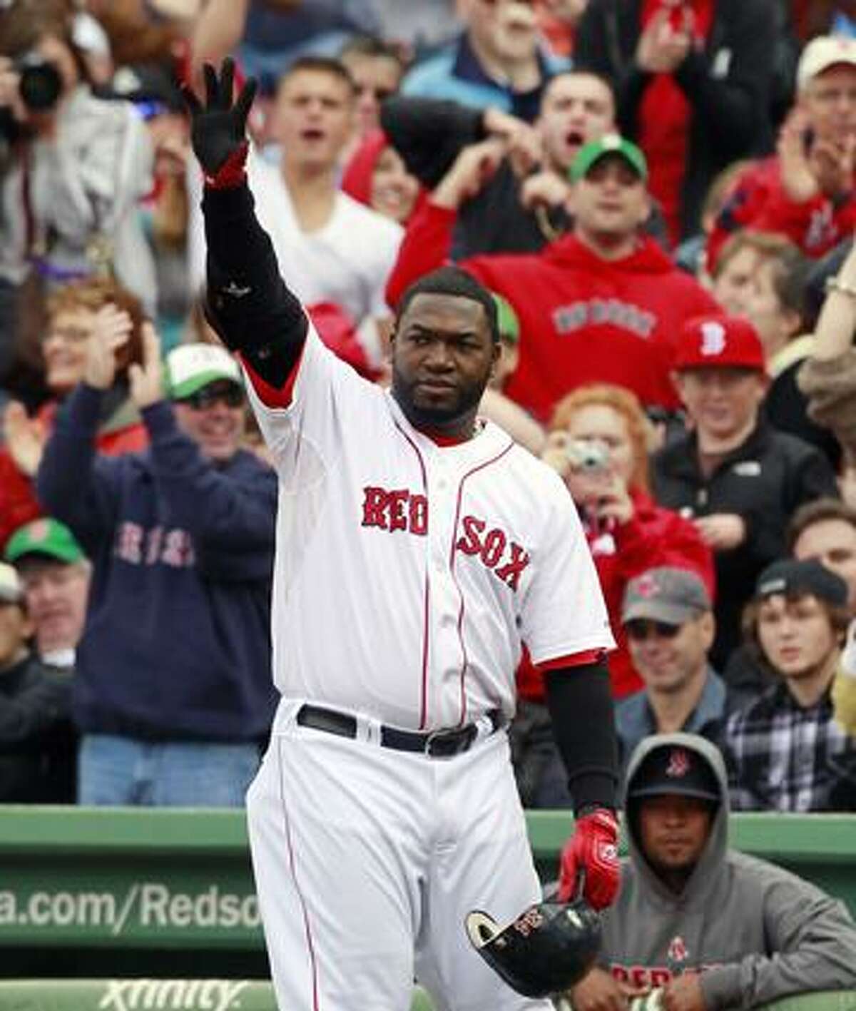 Boston Red Sox's David Ortiz waves to the crowd as he leaves a baseball game against the New York Yankees in the sixth inning, Sunday in Boston. (AP Photo/Michael Dwyer)