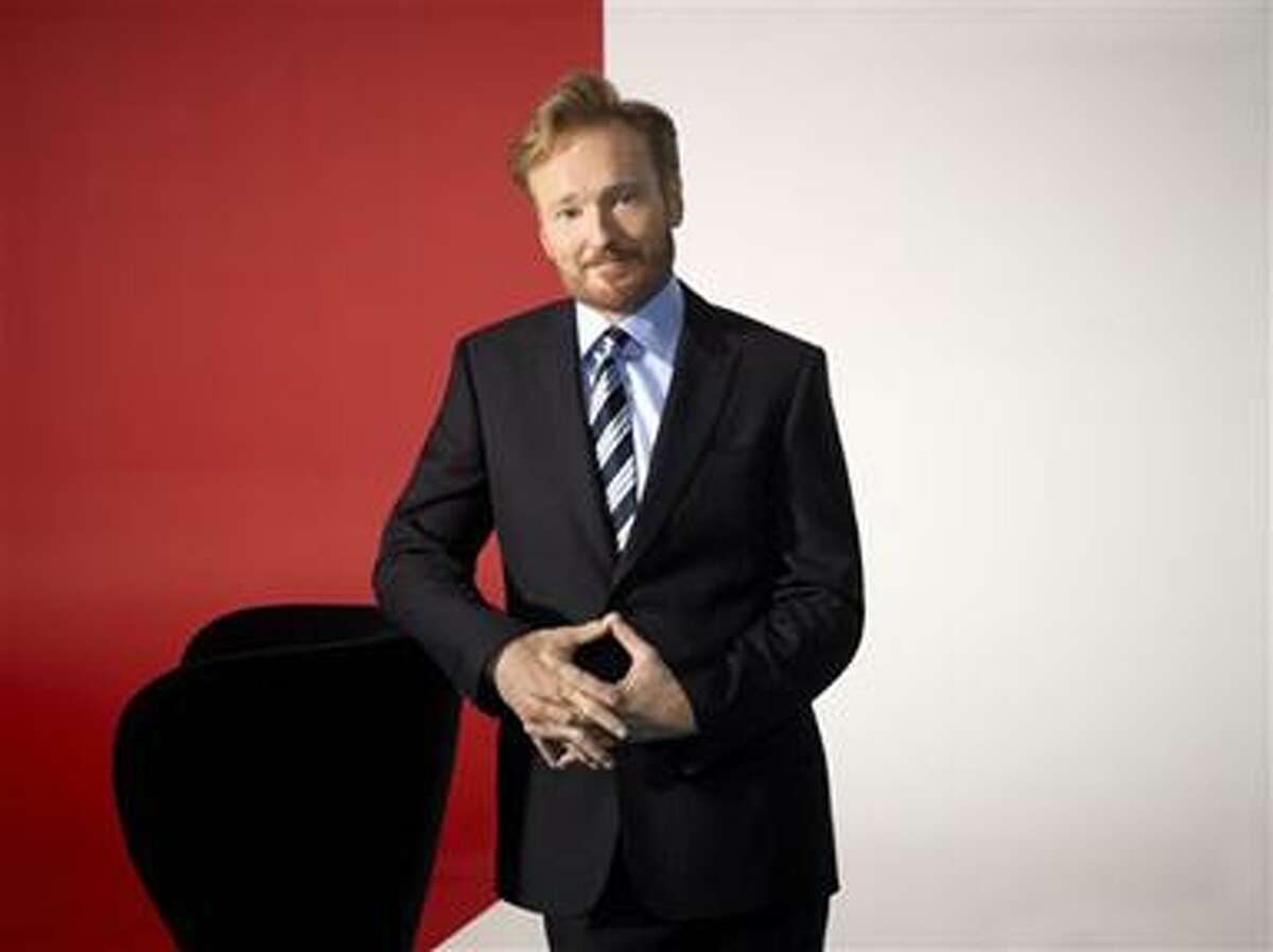 In this undated publicity image released by TBS, TV host Conan O'Brien, is shown. O'Brien will debut his new late night show, "Conan," on Monday, Nov. 8, 2010 at 11:00 p.m. EST on TBS. (AP Photo/TBS, Art Streiber)