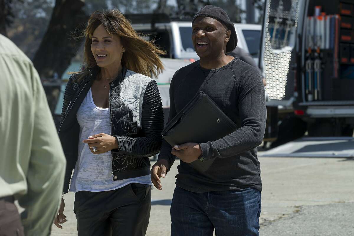 From left: Nicole Ari Parker and Kim Bass on the set for the new movie HeadShop at Treasure Island on Wednesday, Aug. 16, 2017, in San Francisco, Calif. HeadShop is directed by Kim Bass and stars Nicole Ari Parker.