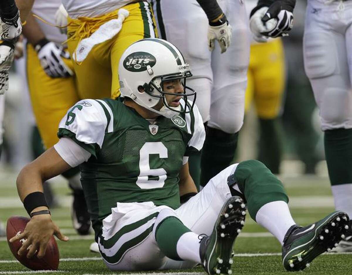 New York Jets quarterback Mark Sanchez (6) after throwing his