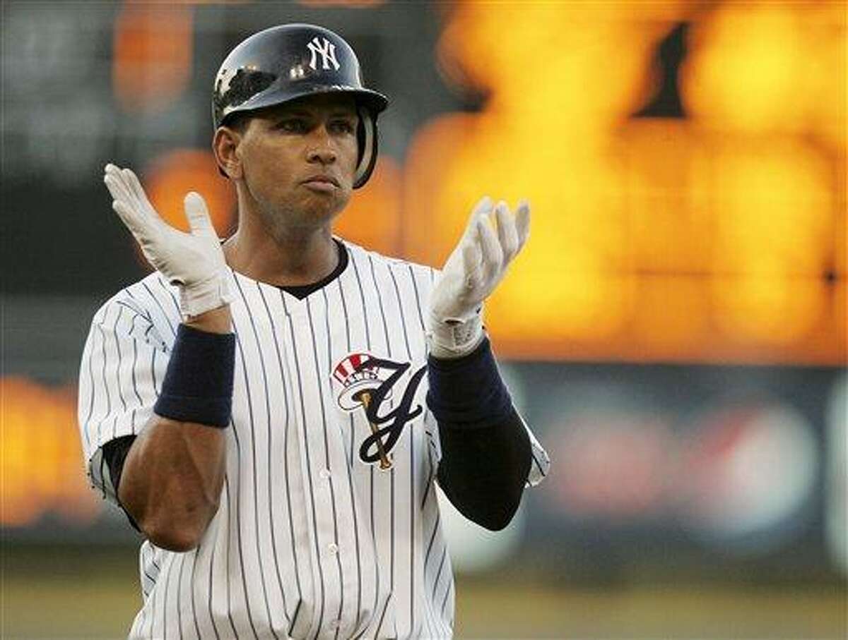 New York Yankees third baseman Alex Rodriguez claps along with the fans after drawing a walk in the first inning in a minor league rehab start for Triple-A affiliate, Scranton/ Wilkes-Berry Yankees against the Durham Bulls at PNC Field in Moosic Pa., Wednesday, Aug. 17, 2011. Rodriguez is set to rejoin the Yankees Thursday in Minnesota in his return from knee surgery. (AP Photo/Rich Schultz)