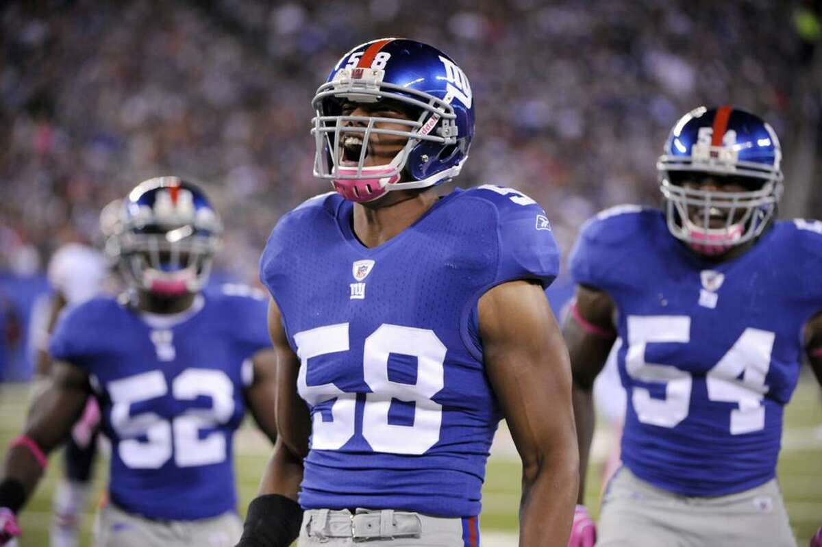 Steady Coughlin has Giants in first heading into bye week