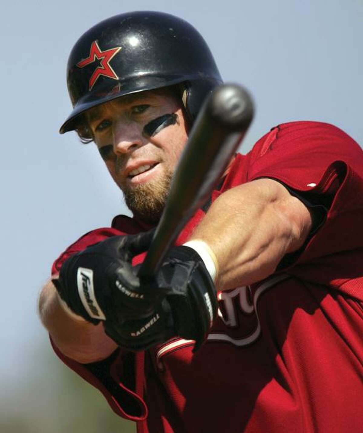 In this March 6, 2006, file photo, Houston Astros' Jeff Bagwell warms up before the start of a spring training baseball game, in Kissimmee, Fla. The Astros announced Sunday that Bagwell, who has been serving as a special assistant to the general manager, will replace hitting coach Sean Berry after the All-Star break. (AP Photo/Steven Senne)