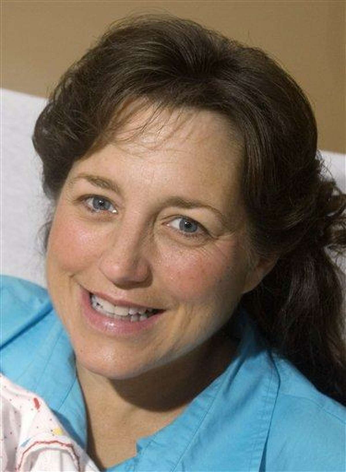 In this Dec. 19, 2008 file picture, Michelle Duggar is shown in Rogers, Ark. Duggar, who stars on the TLC reality show "19 Kids and Counting," has suffered a miscarriage after announcing she was expecting her 20th child. Associated Press