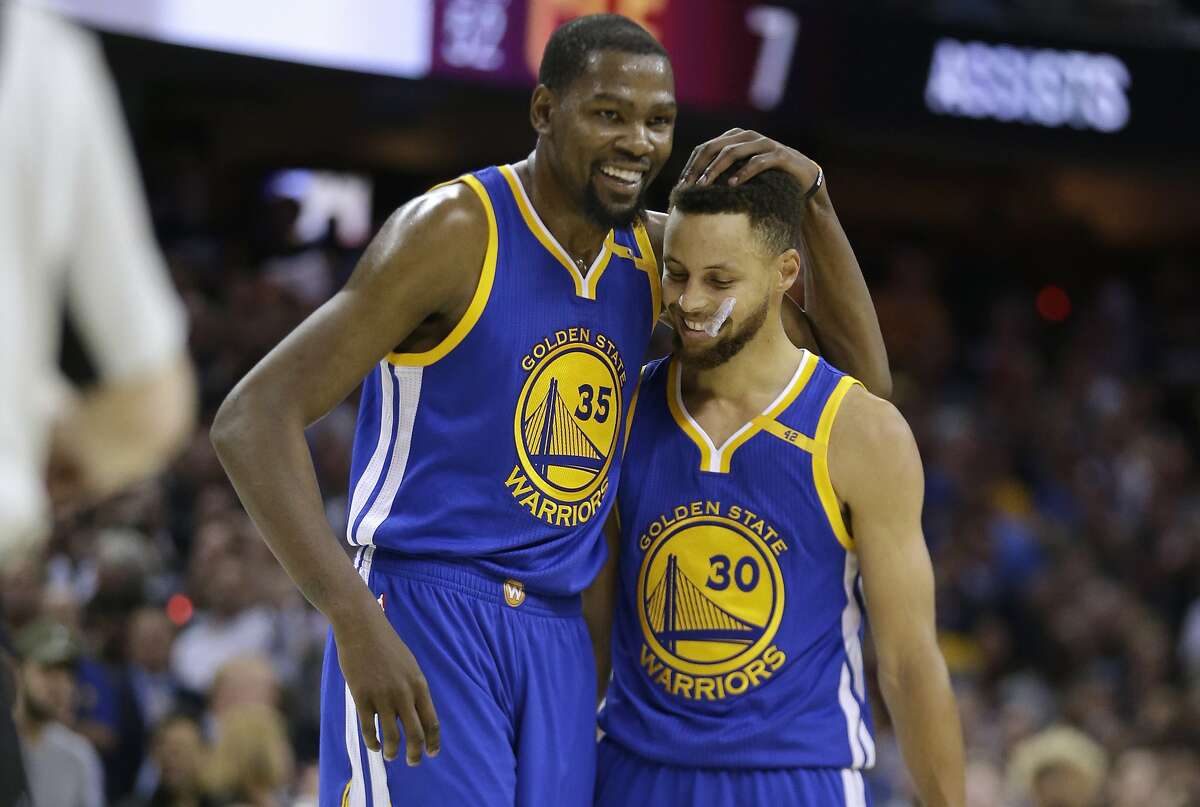 On Thursday, NBA Finals MVP Kevin Durant made his stance on the issue clear: he would not go and does not want to meet President Trump. In this Friday, June 9, 2017, file photo, Golden State Warriors' Kevin Durant (35) hugs teammate Stephen Curry (30) during the first half of Game 4 of basketball's NBA Finals against the Cleveland Cavaliers, in Cleveland. 