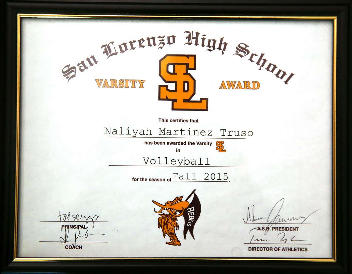 Naliyah Martinez-Truso, 17 years old, shows a volleyball varsity award that has the school mascot (confederate soldier) on Thursday, August 17, 2017, in Vallejo, Calif..