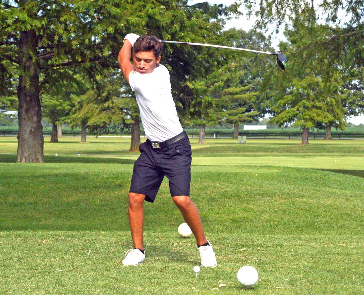 Edwardsville senior Ben Tyrrell hits a tee on hole No. 6 at Belk Park Golf Course in Wood River during Thursday’s Madison County Tournament.
