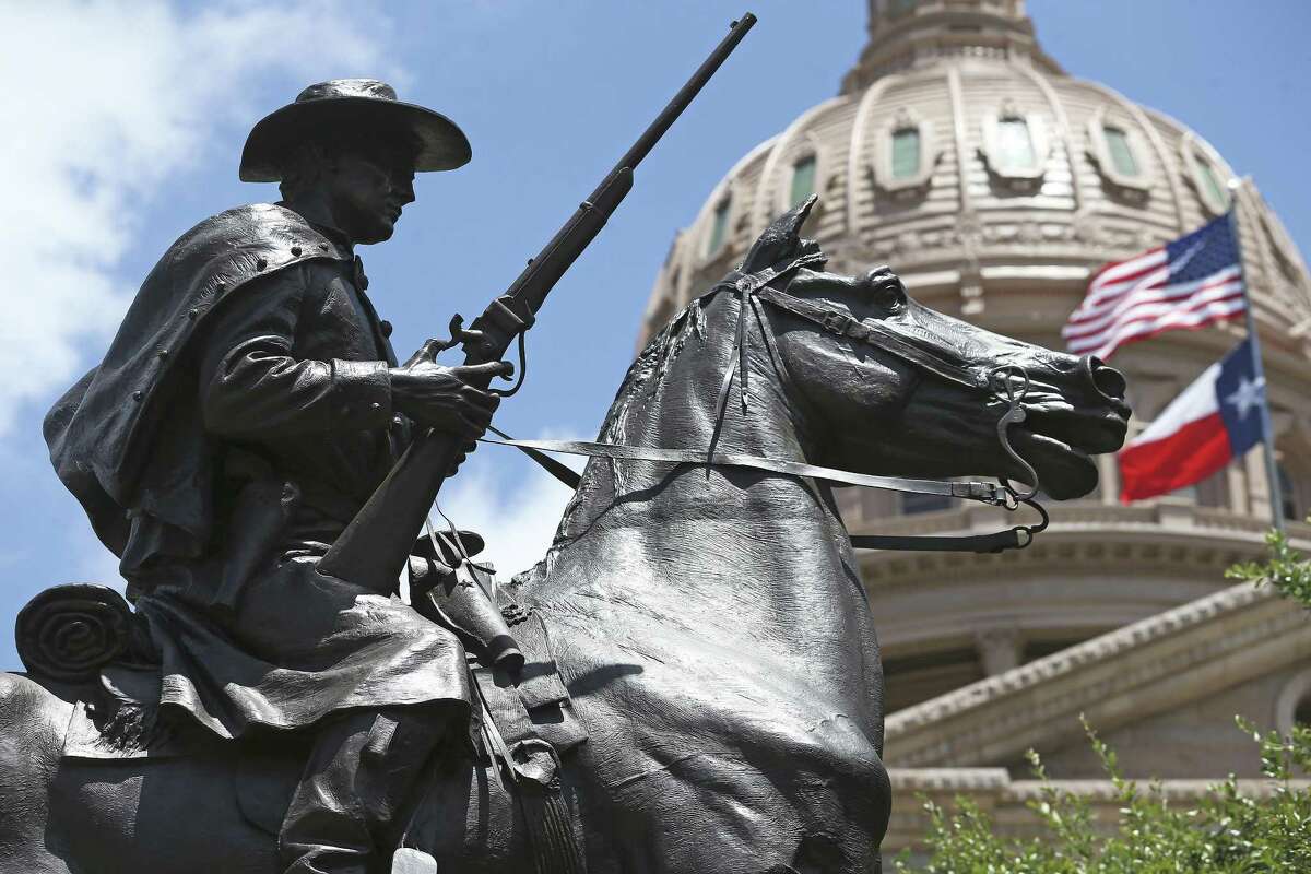 The "Terry's Texas Rangers" cavalry monument is near the south entrance to the Capitol on August 16, 2017.